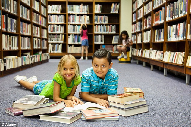 1415442181011_wps_1_Children_reading_books_on.jpg